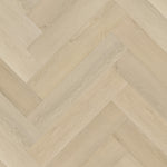 licht beige eiken visgraatvloer met zichtbare houtstructuur en brede planken in visgraatpatroon