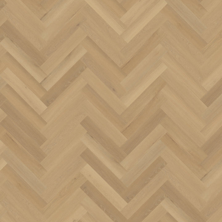 licht beige eiken vloer met visgraat patroon en subtiele houtstructuur