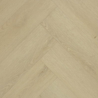 Licht eiken visgraatvloer met subtiele houtstructuur en een natuurlijke, zachte beige tint.