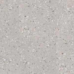lichtgrijze tegelvloer met kleine terrazzo structuur en verschillende tinten wit, beige en grijs in willekeurig patroon