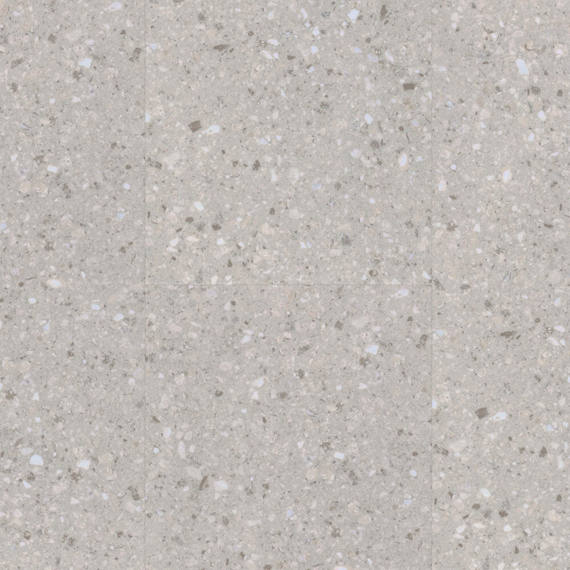 lichtgrijze tegelvloer met kleine terrazzo structuur en verschillende tinten wit, beige en grijs in willekeurig patroon